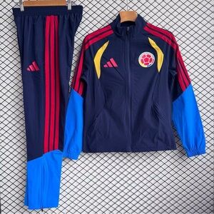 Adidas Navy Track Suit with Red and Yellow Accents